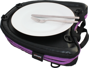 Image shows a Knork and knife upon a clean, white plate, which is being used on top of a Curve laptray bag