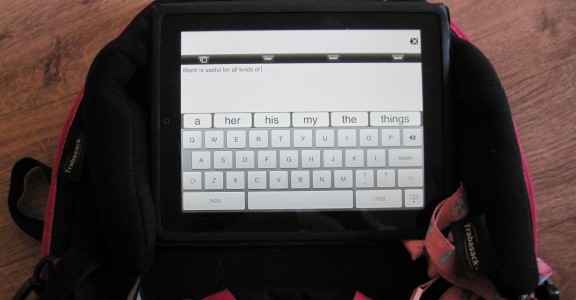 Image of an iPad Communication Aid being used on the tray of the Trabasack Curve