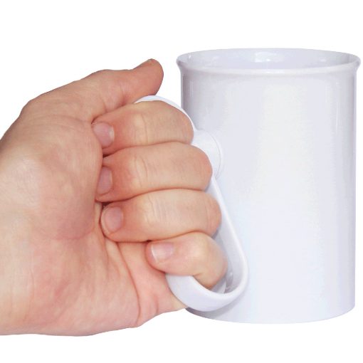 Photograph showing male hand holding white handSteady mug by the handle