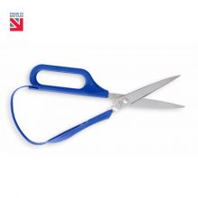 Image is a photograph of easi-grip self-opening scissors on a white background. In the top lefthand corner there is a logo of the Union Flag with text that reads: "Made in Britain".