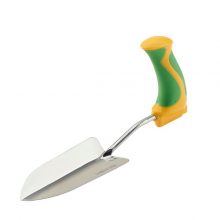 Image is a photograph of the easi-grip trowel with a green and yellow handle, on a white background