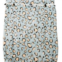 Image shows a photograph of a fleece wheelchair leg cover in "Blue Leopard" design, featuring a light blue background with beige and black leopard print spots.
