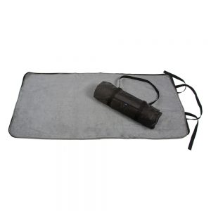 Image shows a Seenin grey bamboo towelling changing mat lay flat on the floor with a rolled-up changing mat on top.