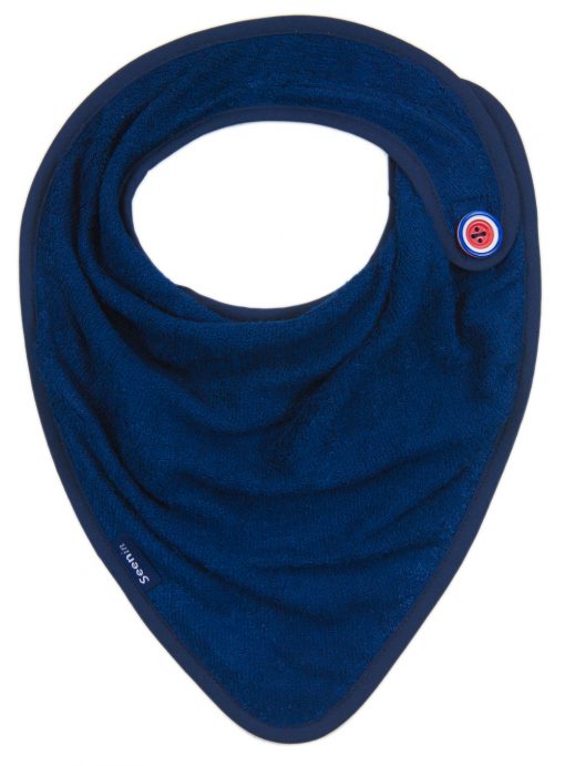 Image shows a photograph of a navy blue bamboo towelling kerchief with a red, white and blue concentric circle-designed button sewn on to one side.