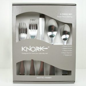 Image is a photograph of the packaging for the Knork 5 piece cutlery set
