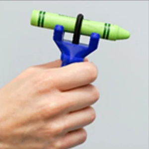 the functionalhand holding a crayon side shot.
