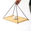 swinging tea tray with a cup on the middle. main image